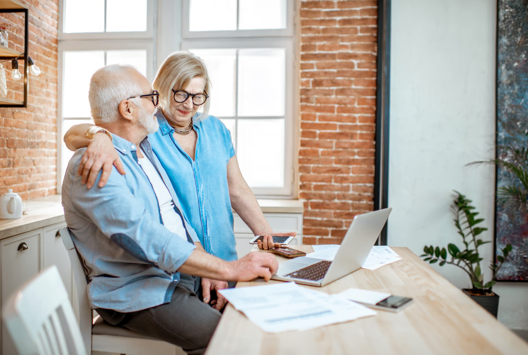 Older couple at a computer together